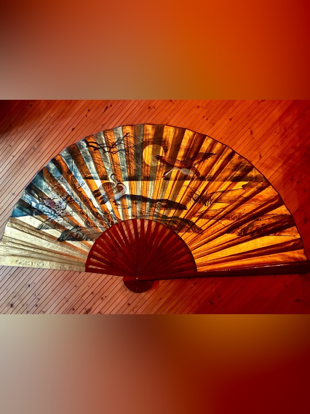 Oversized golden handpainted fan